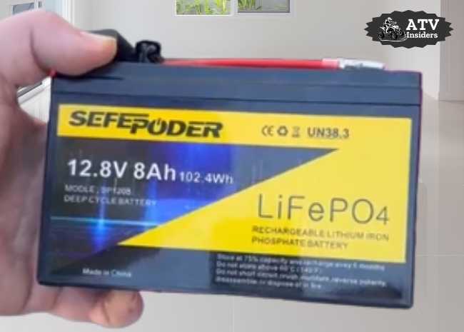 SEFEPODER battery held in hand